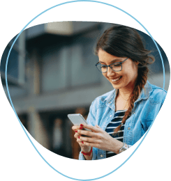 woman looking phone and smiling