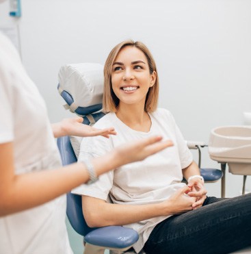 patient smiling in dental chair